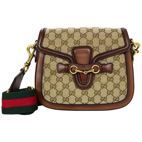 gucci brown crossbody|More.